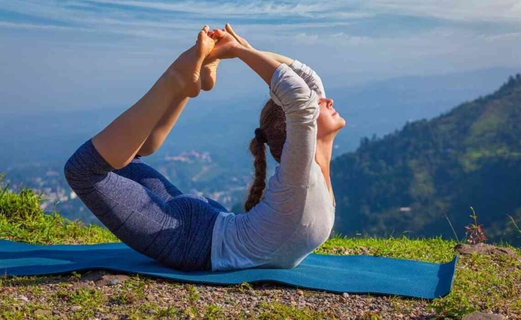 dhanurasana or bow pose in yoga dhanurasana or bow pose in yoga