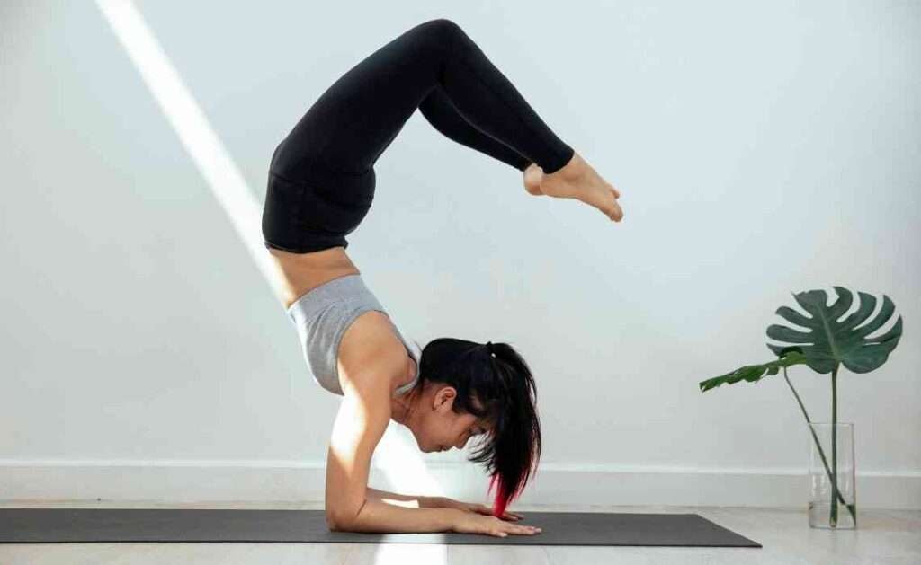 Scorpion Pose or Vrschikasana